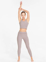 Puma Světle fialové dámské sportovní cropped tílko Puma Studio Yogini